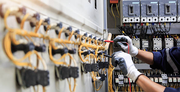 Professional Electrician technician working in West Little River, FL